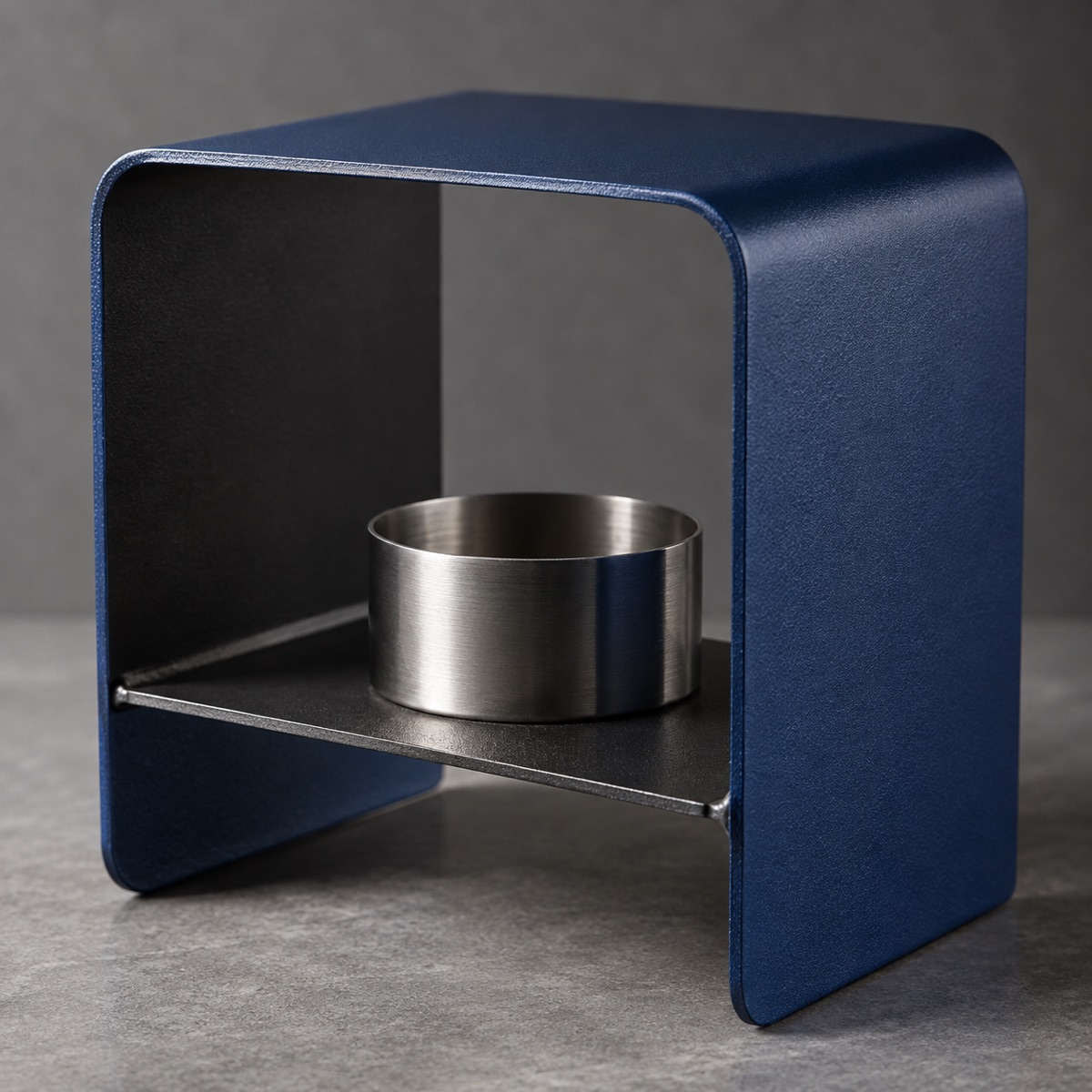 Powder-coated formed metal home accessory with welded join
