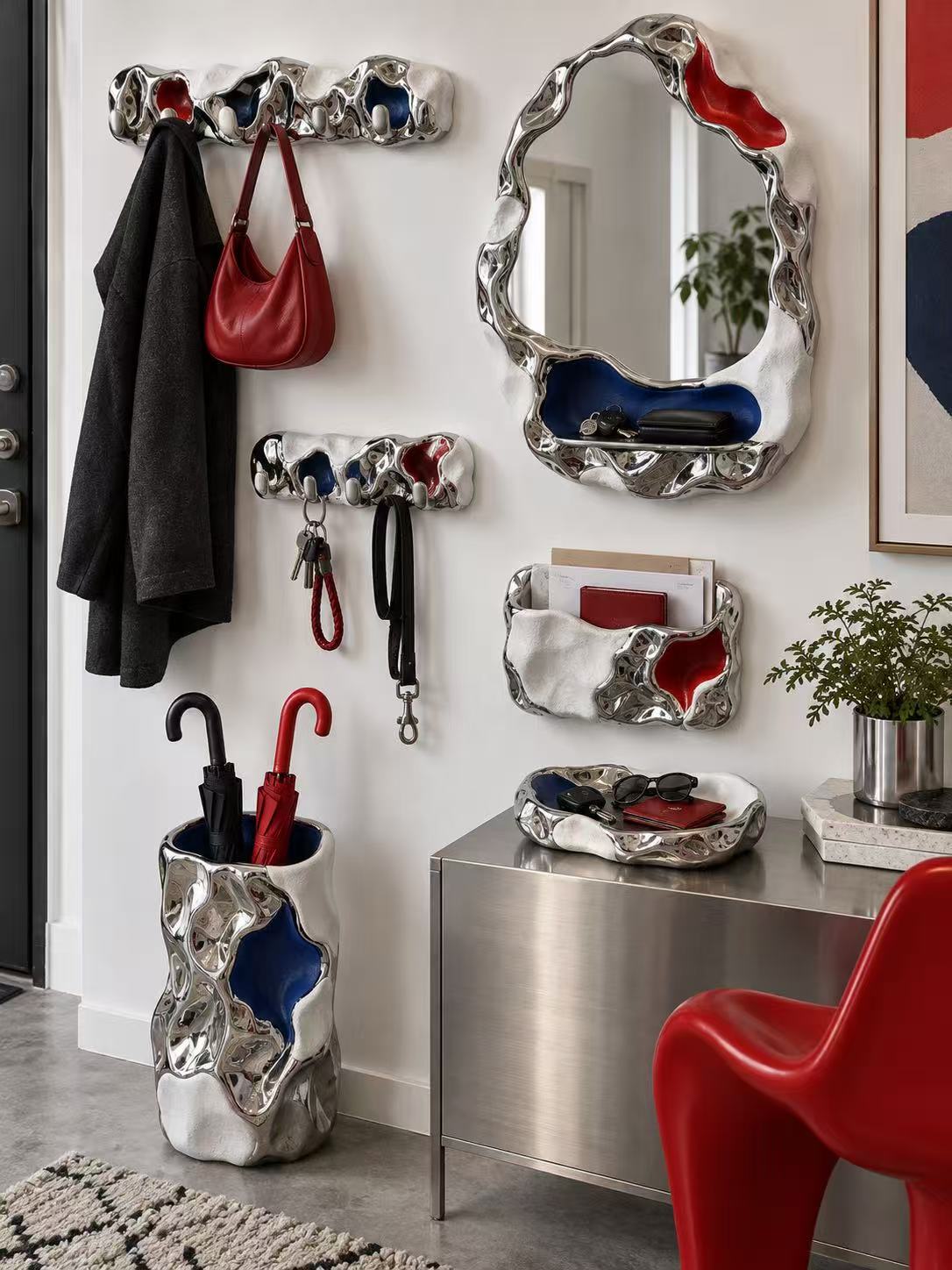 Sculptural metallic hallway organisers, mirror, hooks and umbrella stand